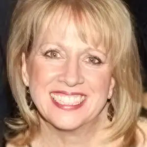 KIM RACAN